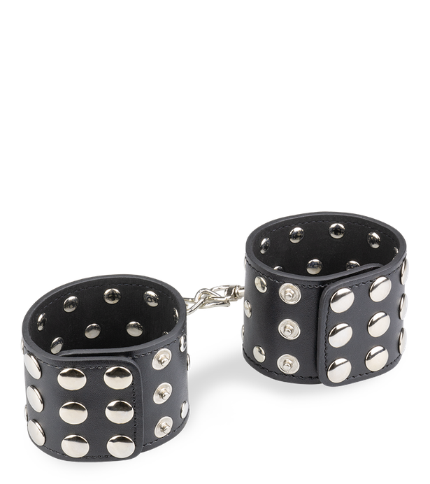 Menottes poignets cuir noir rivets